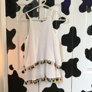 Flowy white tank top with tassels